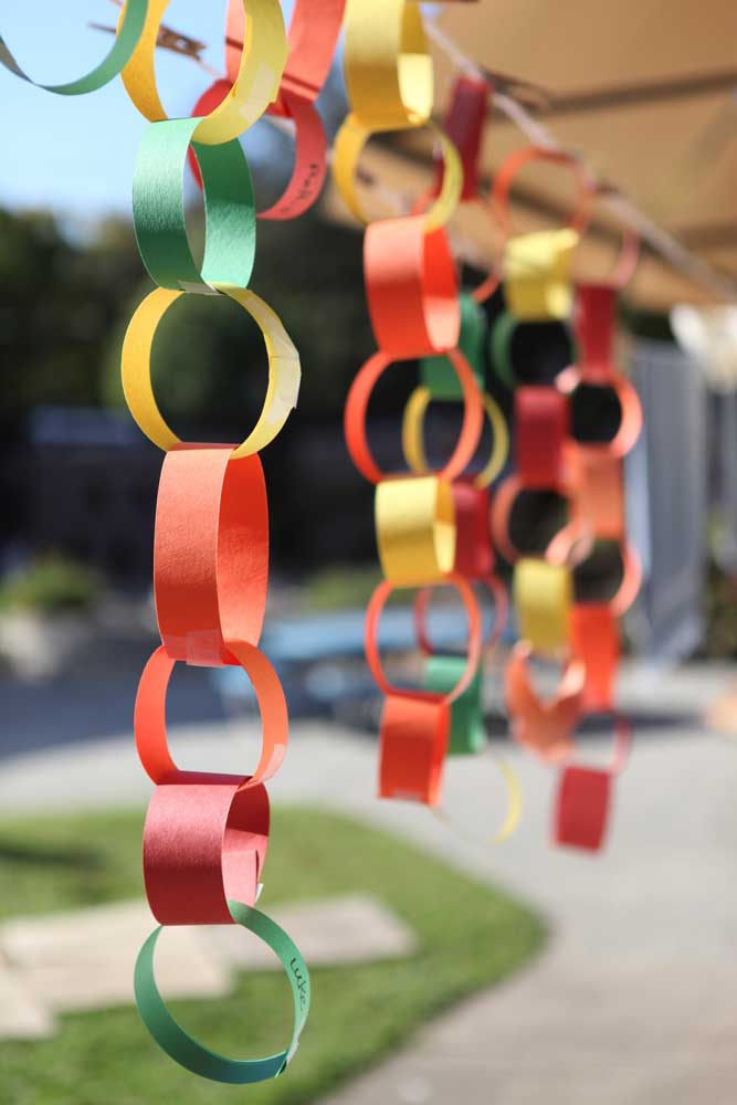 Hand made, colorful, paper chains hanging as décor.